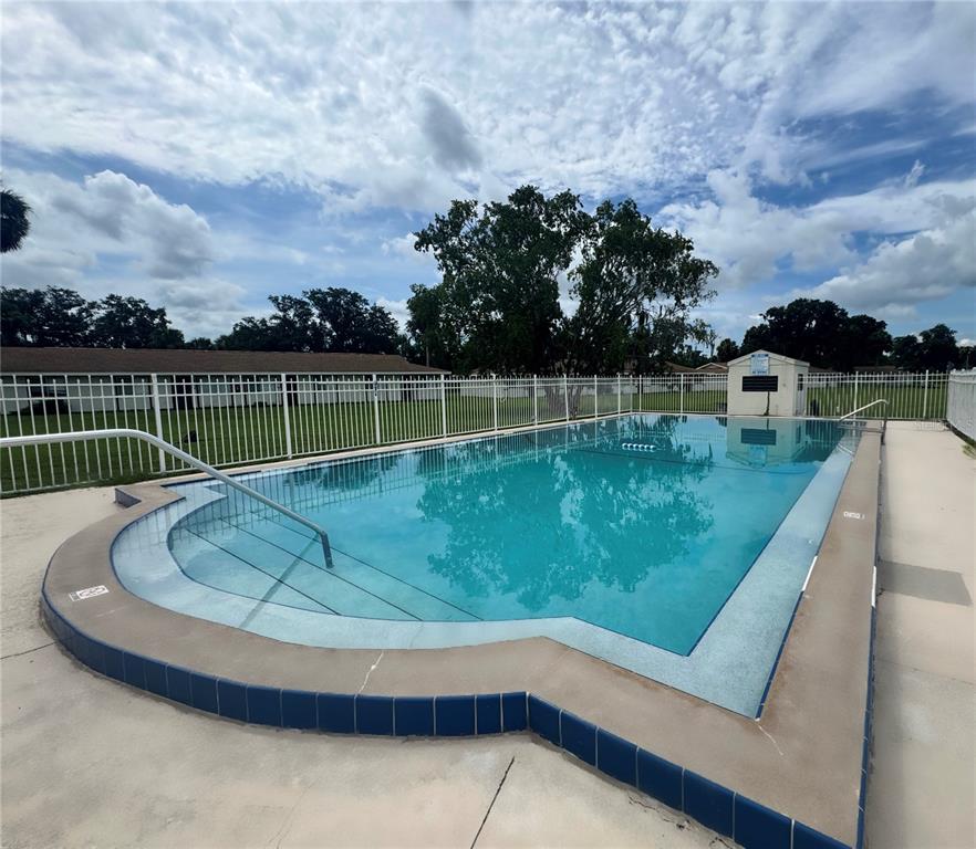 2744 Botts Landing Road, Unit 702 DeLand, FL 32720 - Photo 11 of 12 a view of a backyard with lake view