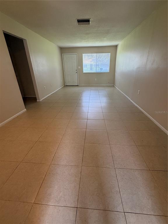 2744 Botts Landing Road, Unit 702 DeLand, FL 32720 - Photo 5 of 12 a view of an empty room and window