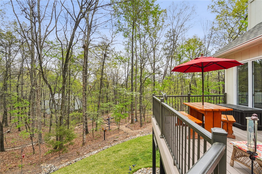 120 Beacon Ridge Circle Salem, SC 29676 - Photo 39 of 48 Enjoy outdoor living and dining on this expansive deck, offering serene forest views.