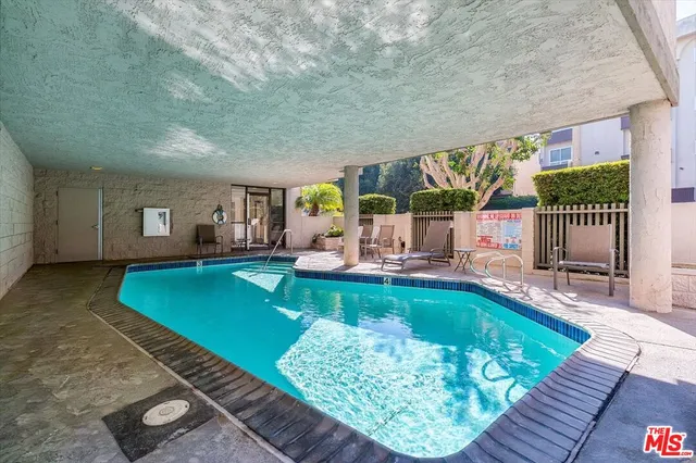 a view of swimming pool outdoor seating