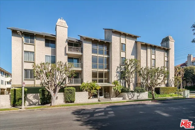 a front view of a building with street view