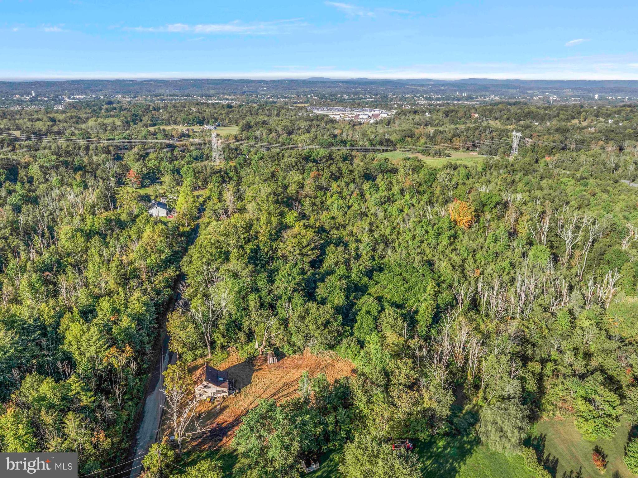 1270 Fennel Road Pennsburg, PA 18073 - Photo 16 of 18 an aerial view of residential houses with outdoor space and trees
