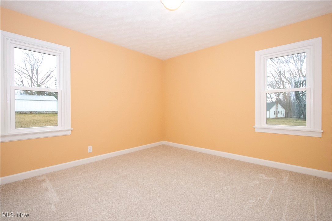 2467 Shreve Road Wooster, OH 44691 - Photo 17 of 27 Carpeted spare room featuring baseboards