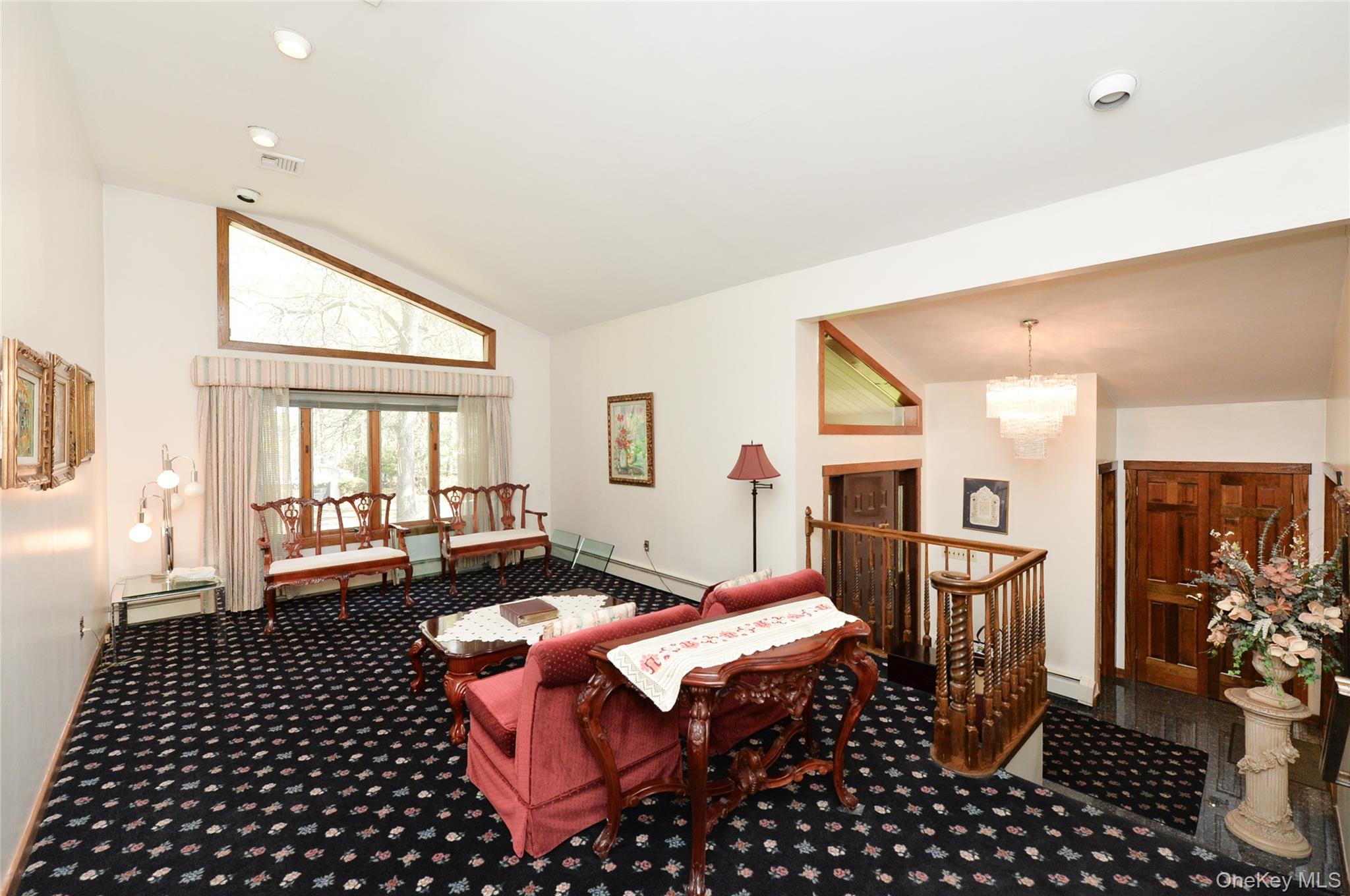 24 Highview Road Monsey, NY 10952 - Photo 5 of 44 a living room with furniture fireplace and a table