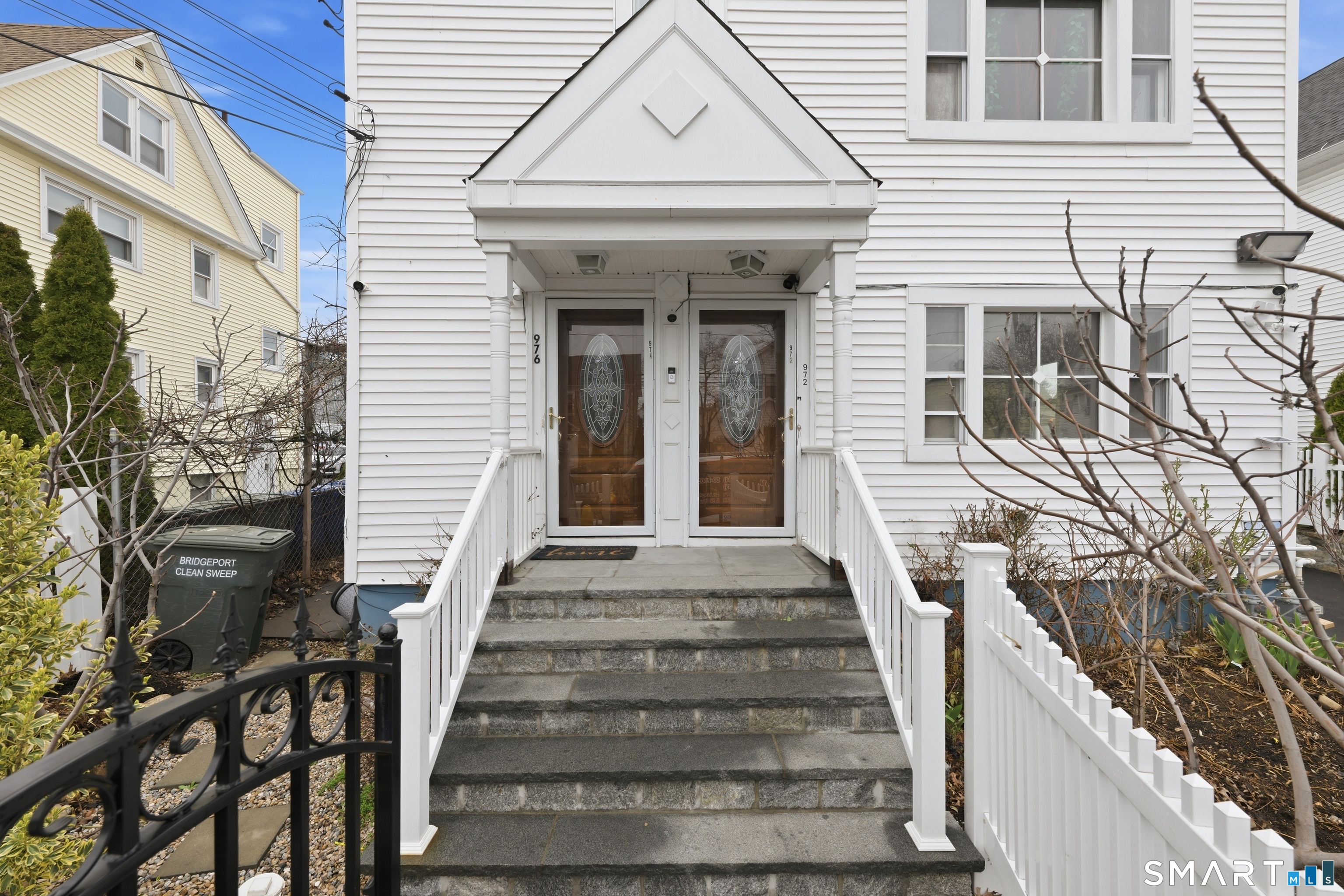 976 Capitol Avenue, Unit 3 Bridgeport, CT 06606 - Photo 2 of 12 a view of a house with wooden door and deck