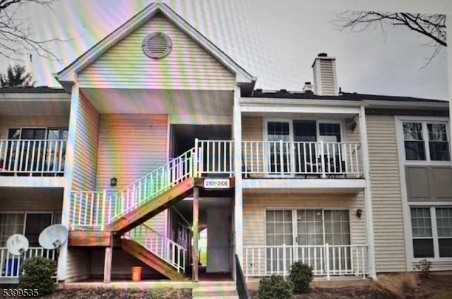 a front view of a house with balcony