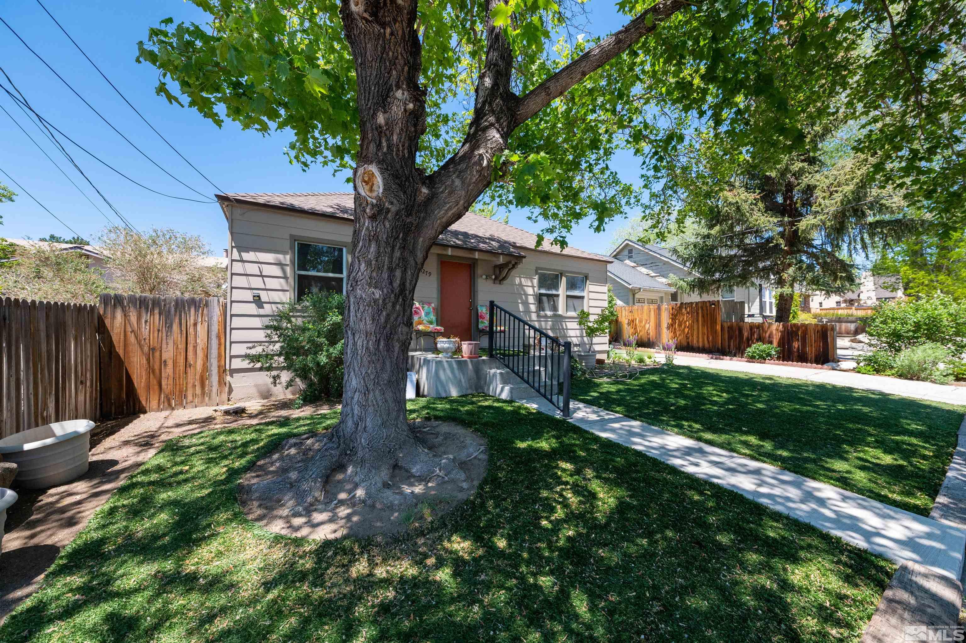 1279 Ridgeway Court Reno, NV 89503 - Photo 3 of 28 a front view of a house with garden