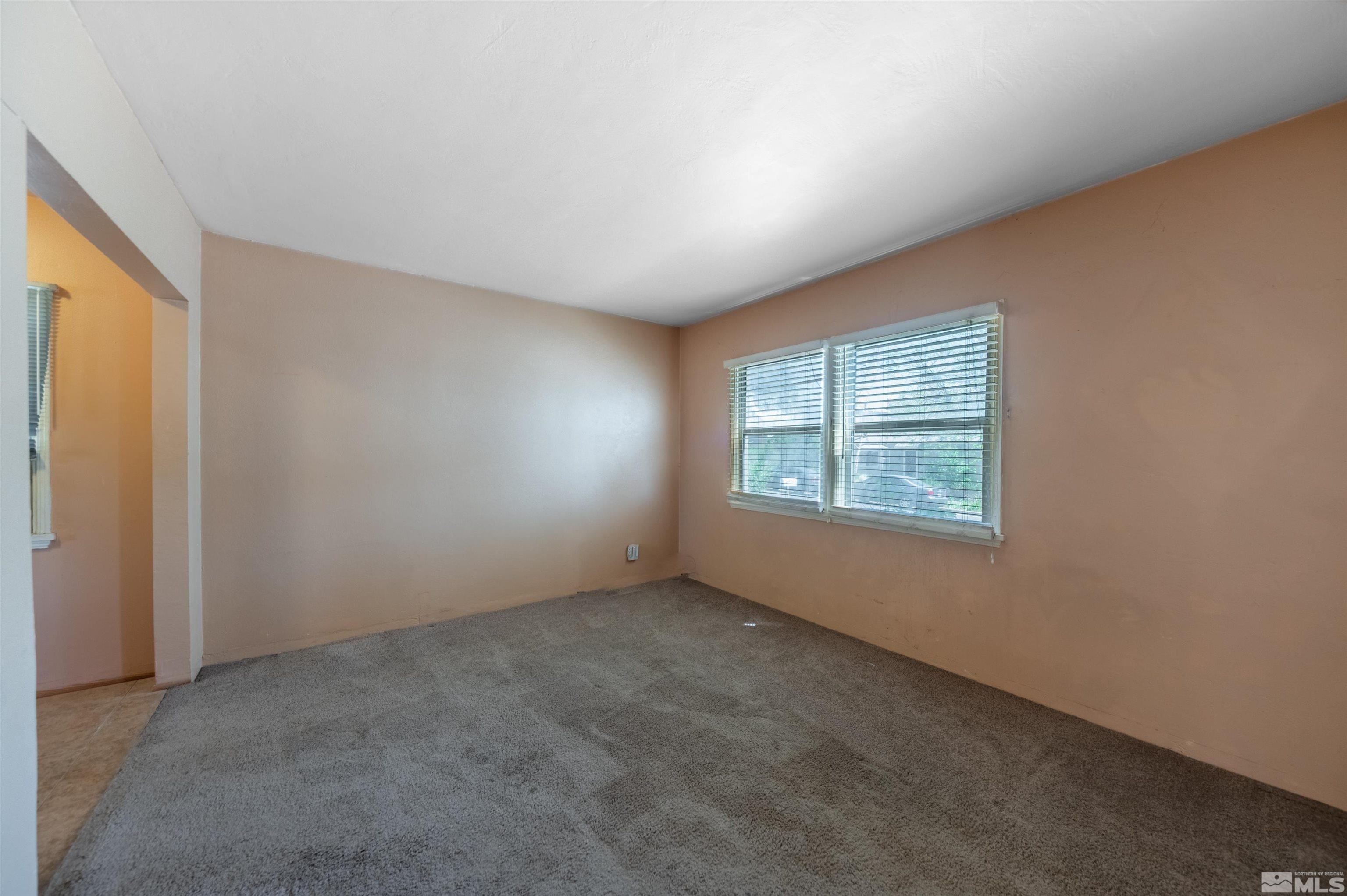 1279 Ridgeway Court Reno, NV 89503 - Photo 8 of 28 an empty room with windows