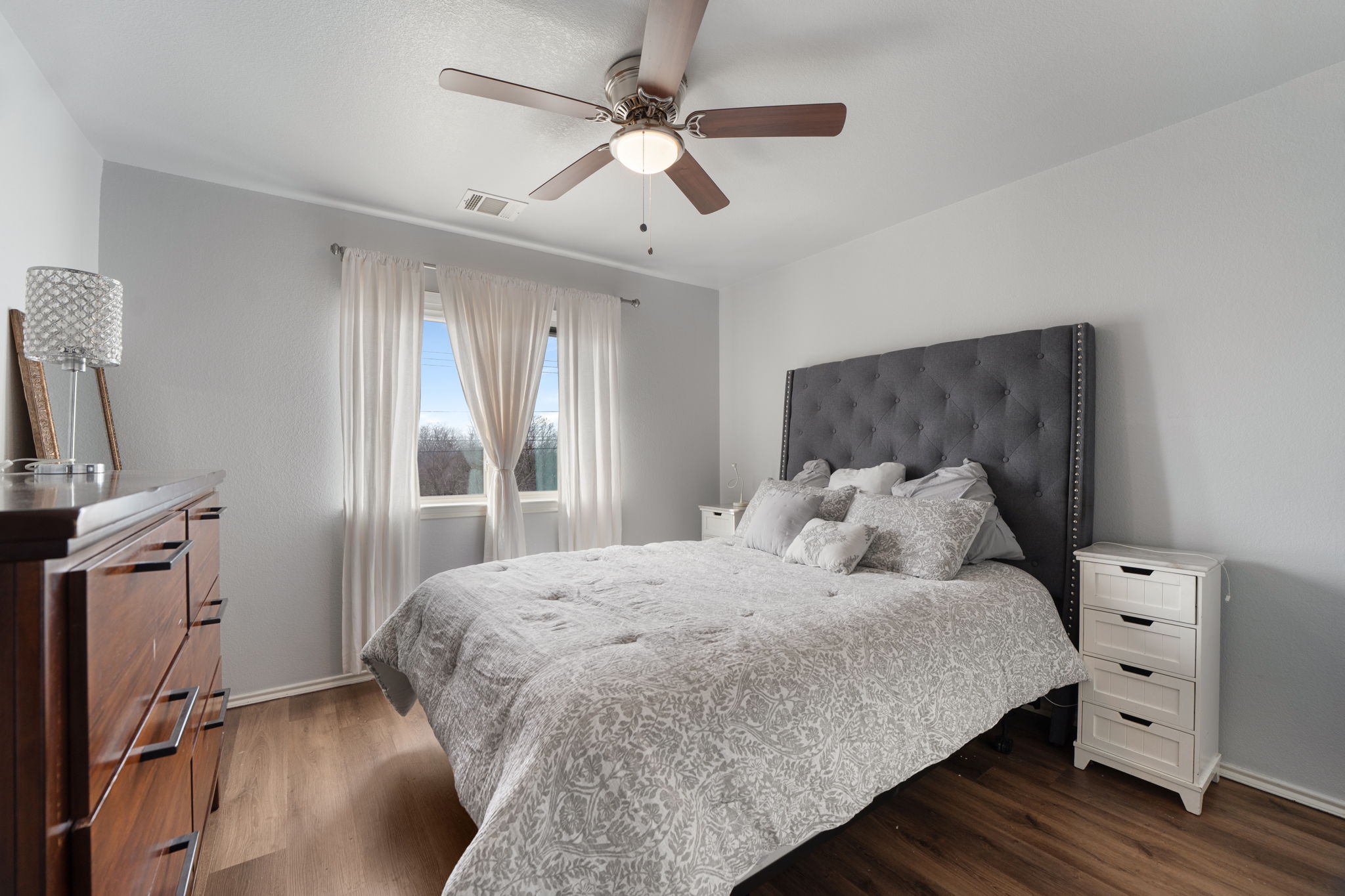 13109 Pealing Way Manor, TX 78653 - Photo 24 of 32 Bedroom featuring wood finished floors and ceiling fan
