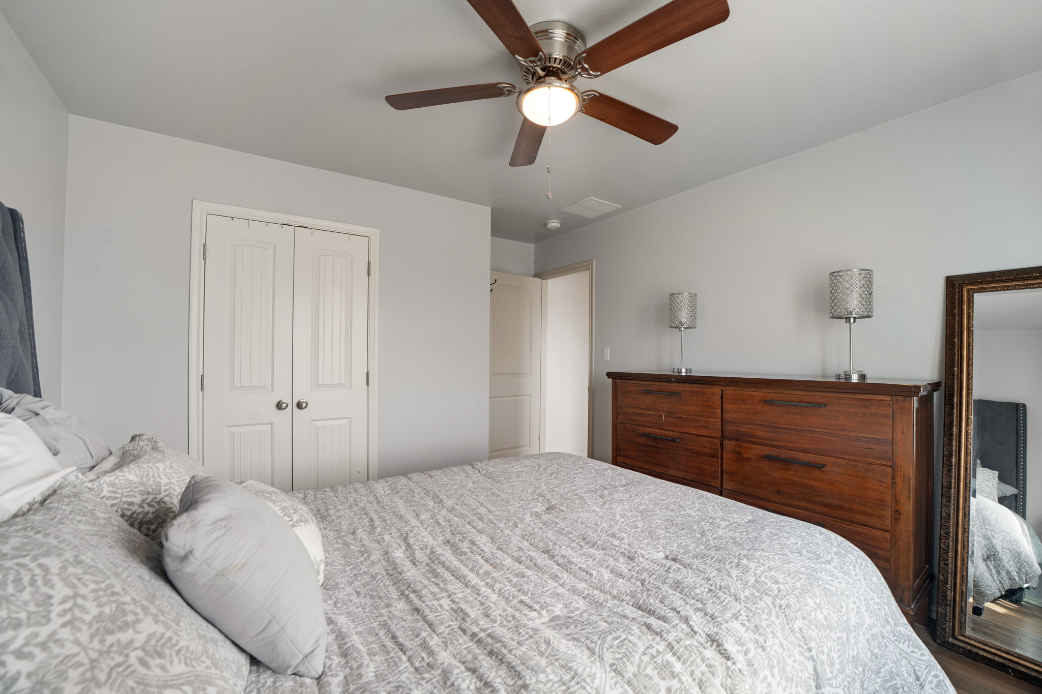 13109 Pealing Way Manor, TX 78653 - Photo 25 of 32 Bedroom featuring a closet and ceiling fan