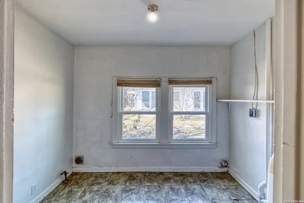 an empty room with a window