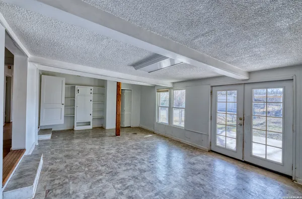 an empty room with windows