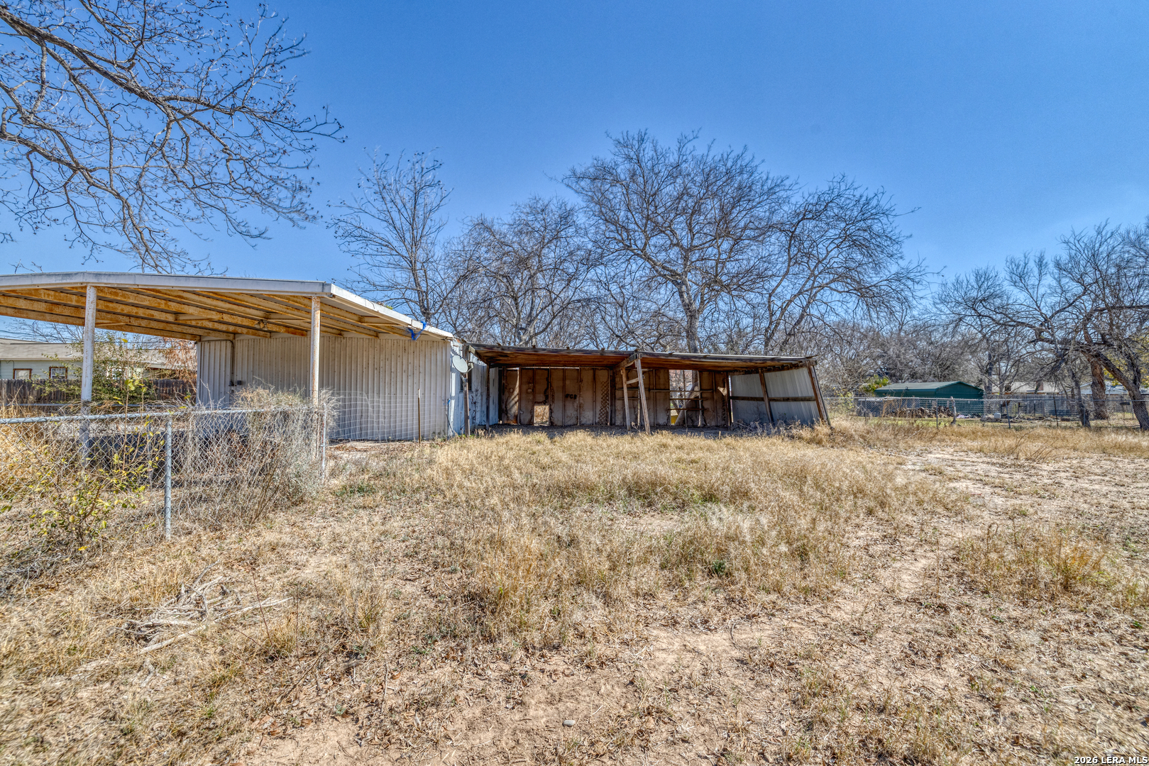 227 West Mueller Street Uvalde, TX 78801 - Photo 23 of 27 a view of a house with a yard
