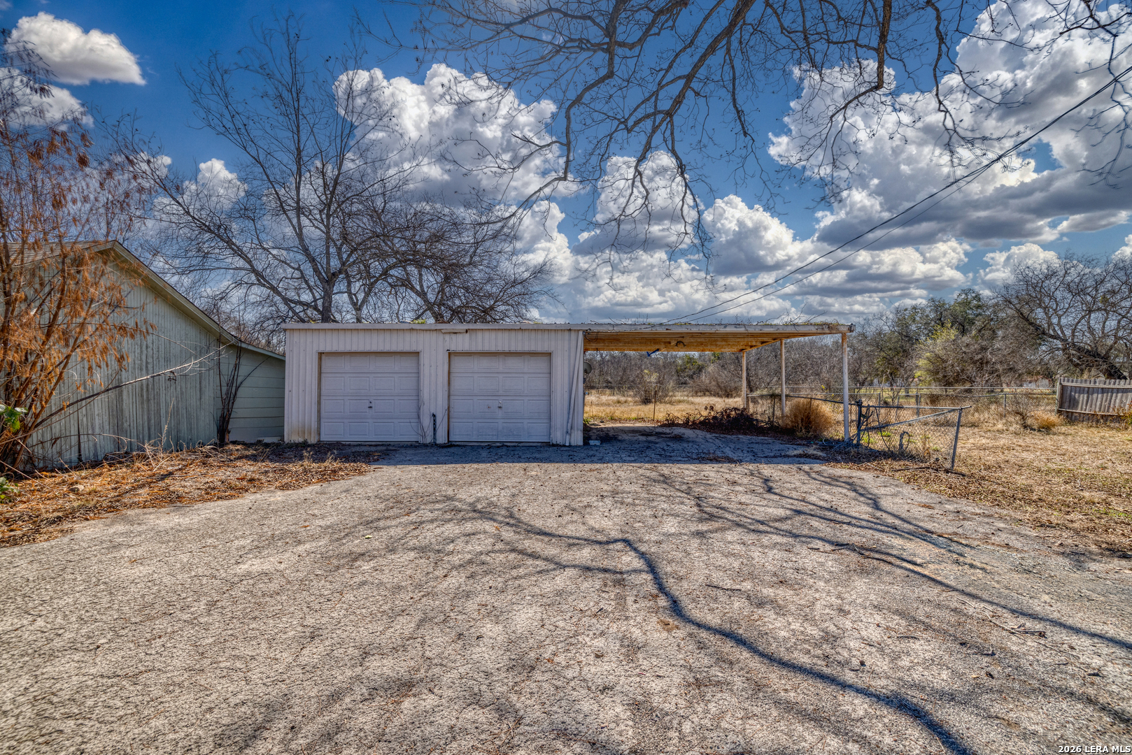 227 West Mueller Street Uvalde, TX 78801 - Photo 25 of 27 a house view with a yard