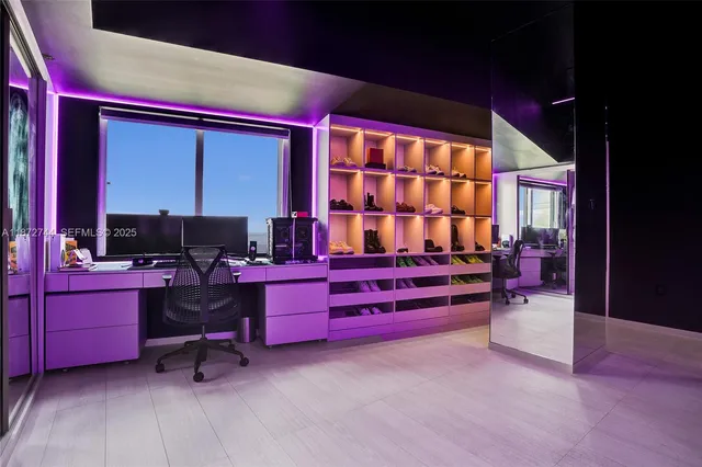 a view of a living room filled with furniture