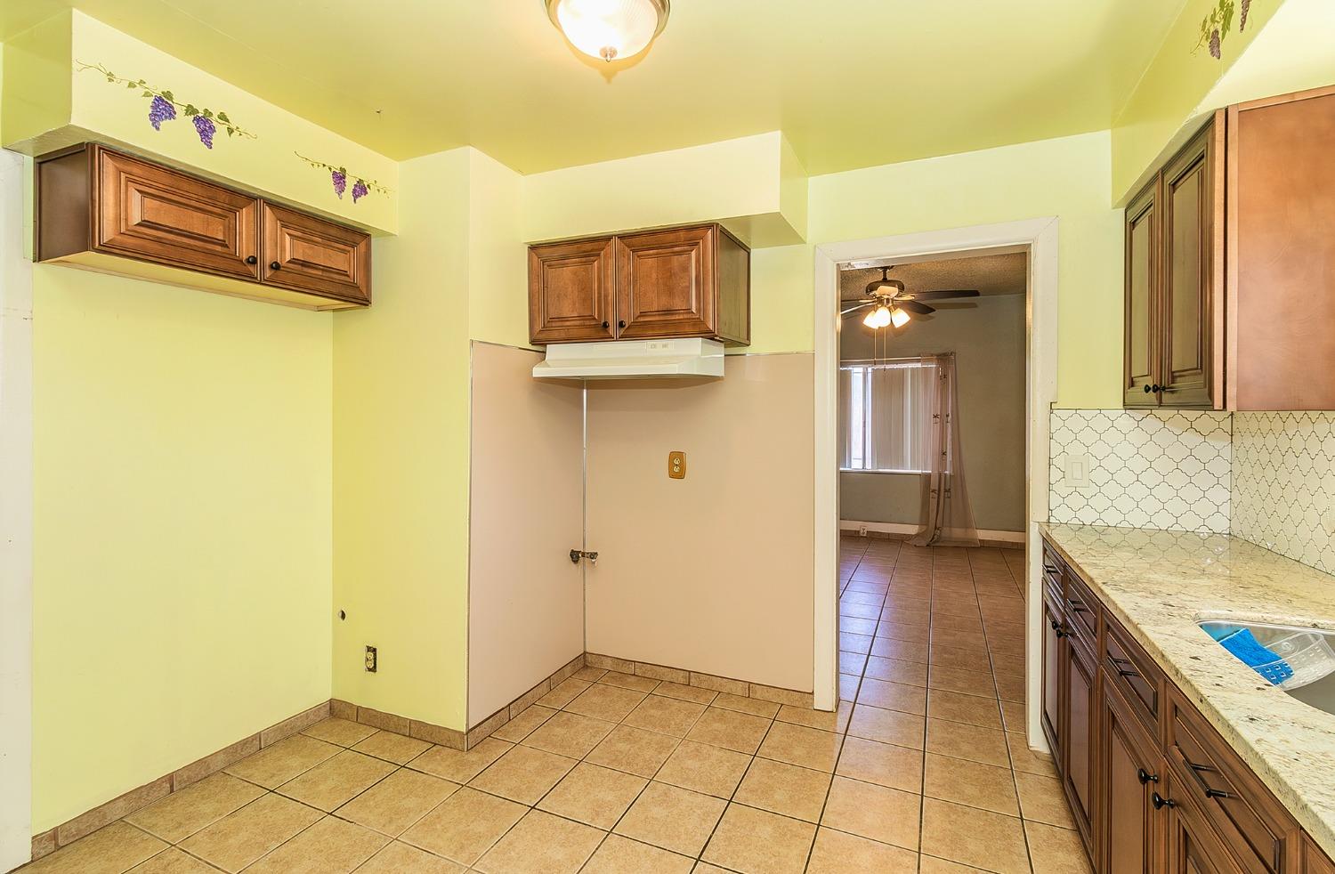 37991 Pound Road Dinuba, CA 93618 - Photo 20 of 32 a view of a kitchen with a sink and cabinets