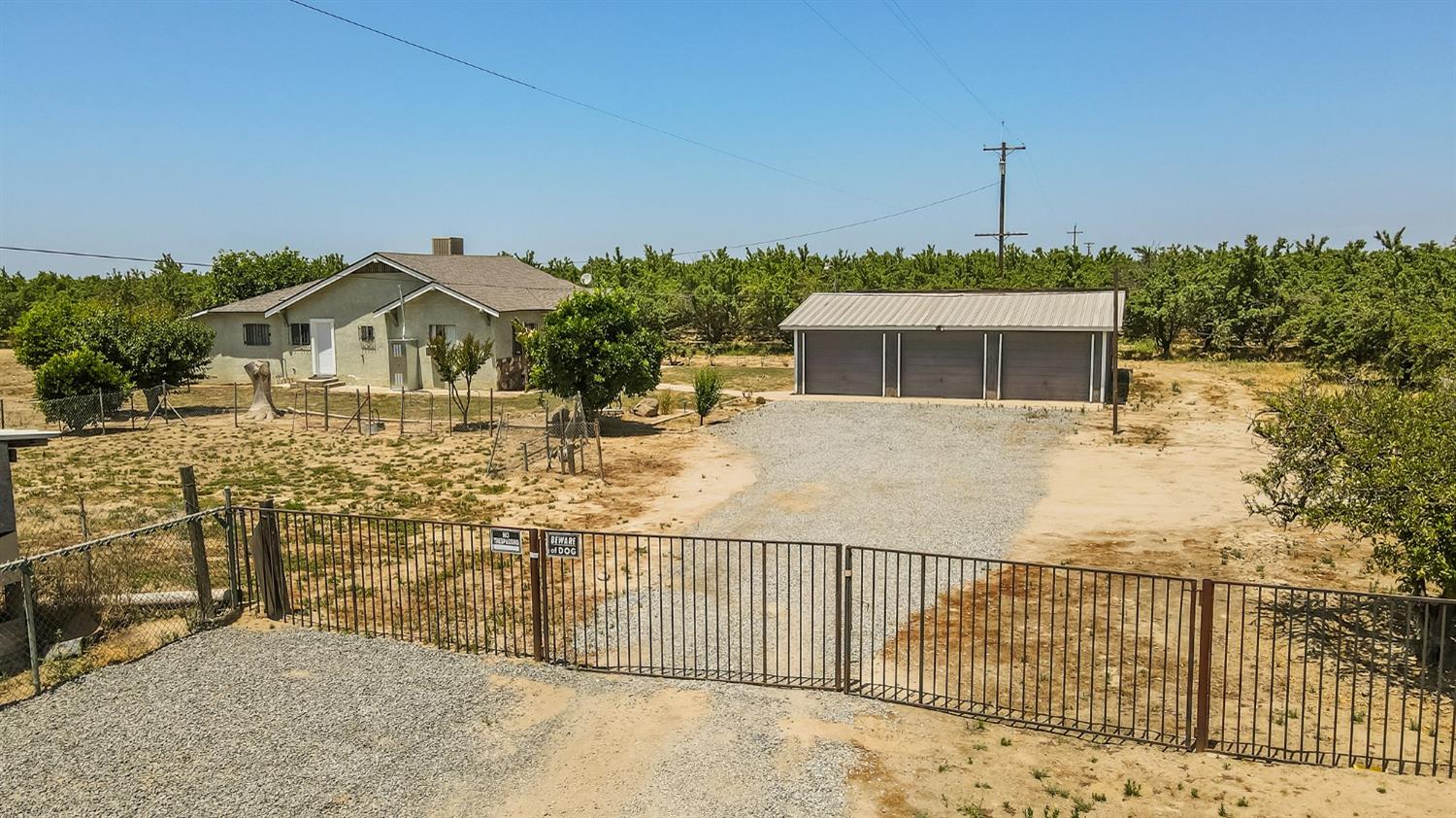 37991 Pound Road Dinuba, CA 93618 - Photo 3 of 32 a view of a terrace with a bench