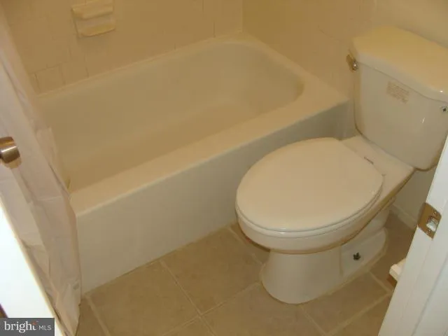 a close view of a toilet in a bathroom