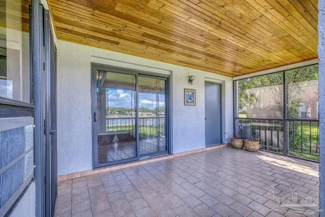 a view of house with a big yard