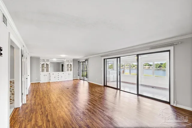 a front view of a house with a yard table and chairs