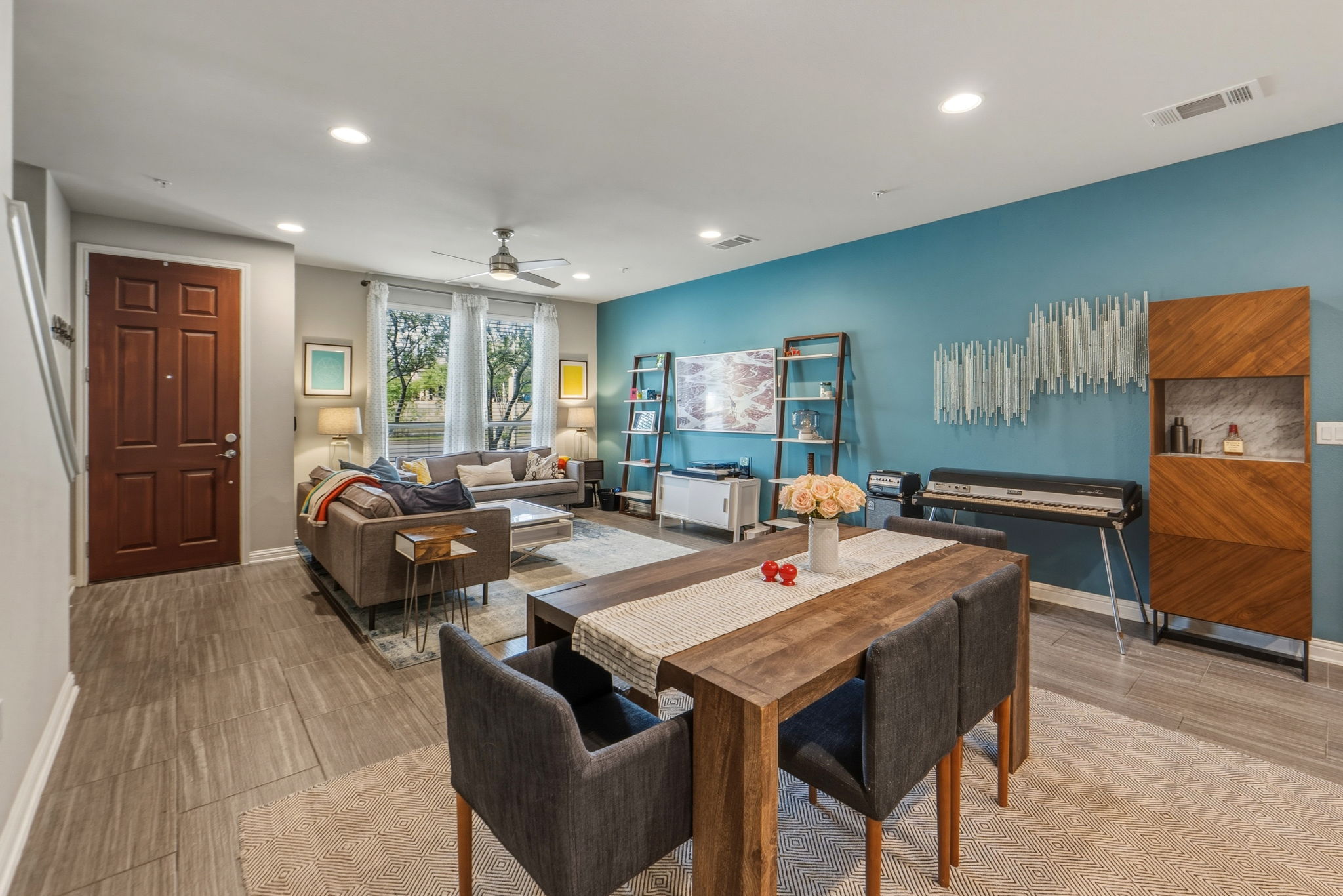 6814 East Riverside Drive, Unit 34 Austin, TX 78741 - Photo 7 of 26 a living room with furniture and a table
