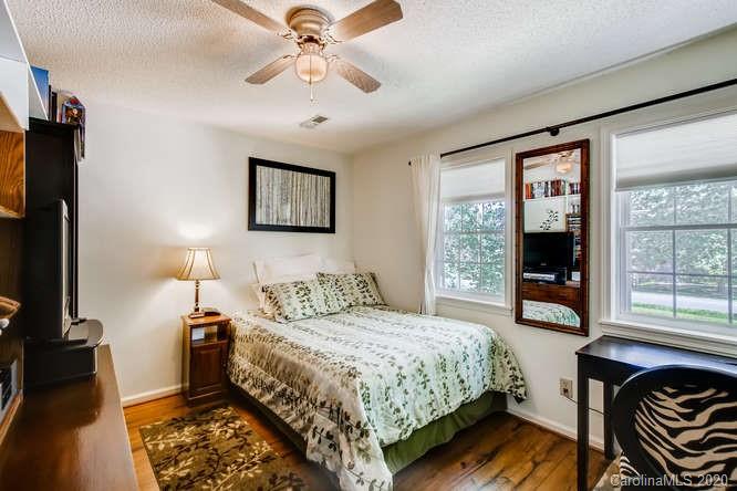 418 Park Ridge Road Albemarle, NC 28001 - Photo 21 of 28 a bedroom with a bed and a window