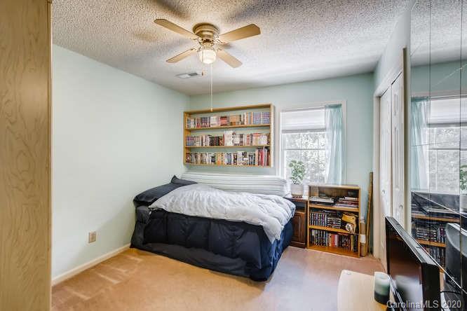 418 Park Ridge Road Albemarle, NC 28001 - Photo 23 of 28 a bedroom with a bed furniture and a window
