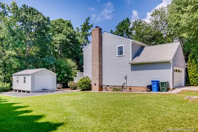 418 Park Ridge Road Albemarle, NC 28001 - Photo 26 of 28 a view of a house with a yard