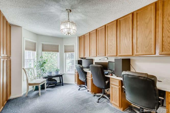 418 Park Ridge Road Albemarle, NC 28001 - Photo 7 of 28 a view of a workspace with furniture and a window