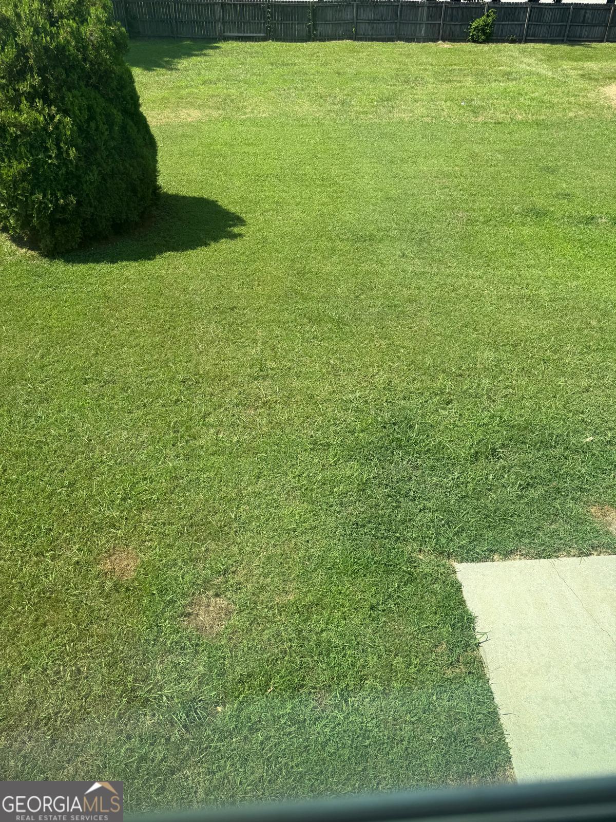 2909 Rusticwood Drive Southwest Snellville, GA 30078 - Photo 17 of 17 a view of yard with swimming pool