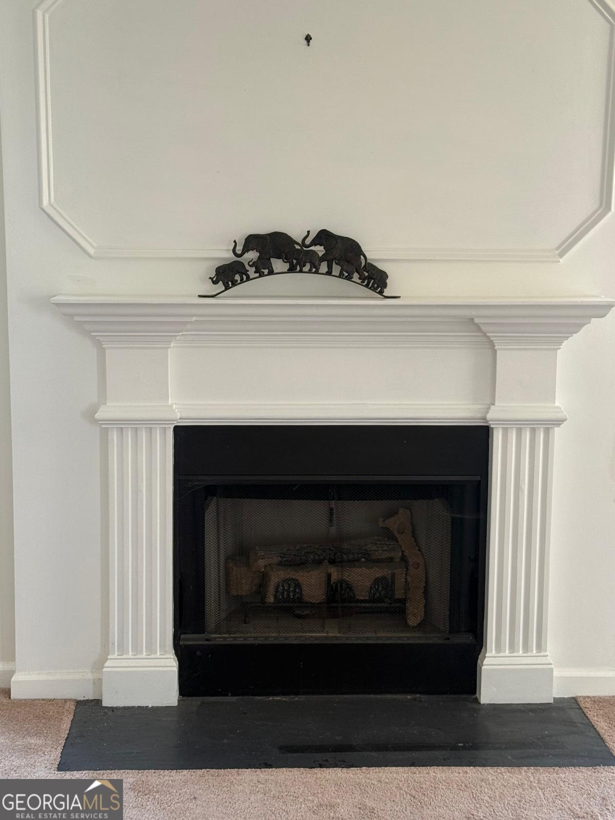 2909 Rusticwood Drive Southwest Snellville, GA 30078 - Photo 2 of 17 a living room with a fireplace
