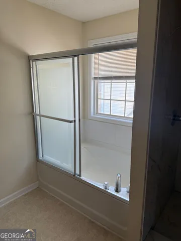 a bathroom with a bathtub