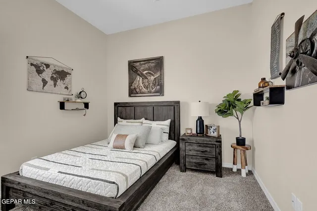 a spacious bathroom with a granite countertop sink a mirror and a