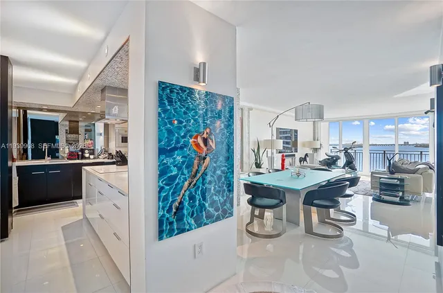 a view of a kitchen and dining room