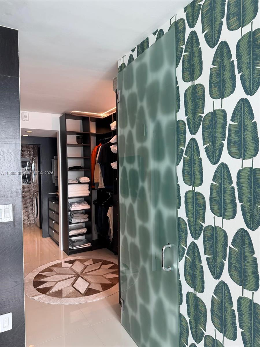 770 Northeast 69th Street, Unit 6F Miami, FL 33138 - Photo 17 of 47 a view of walk in closet