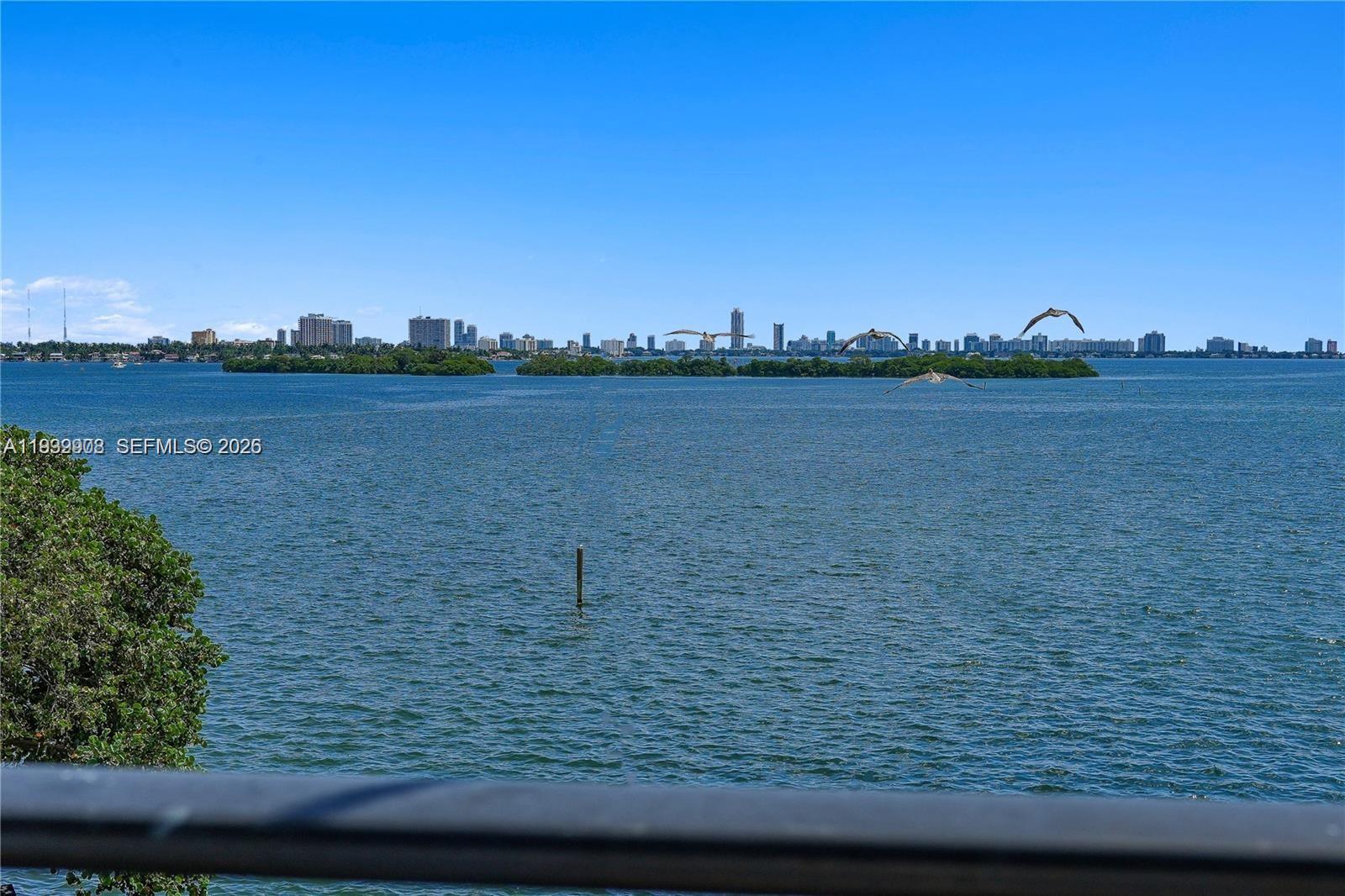 770 Northeast 69th Street, Unit 6F Miami, FL 33138 - Photo 2 of 47 a view of a lake