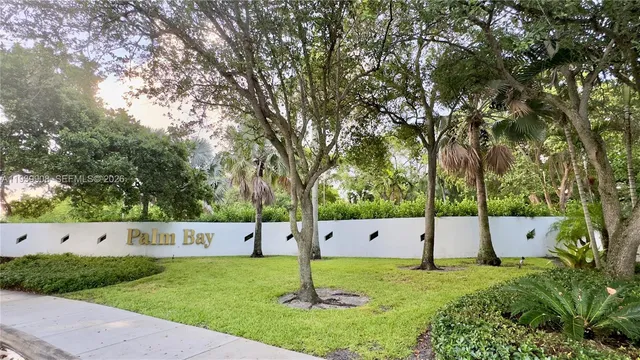 an outdoor space with lots of trees