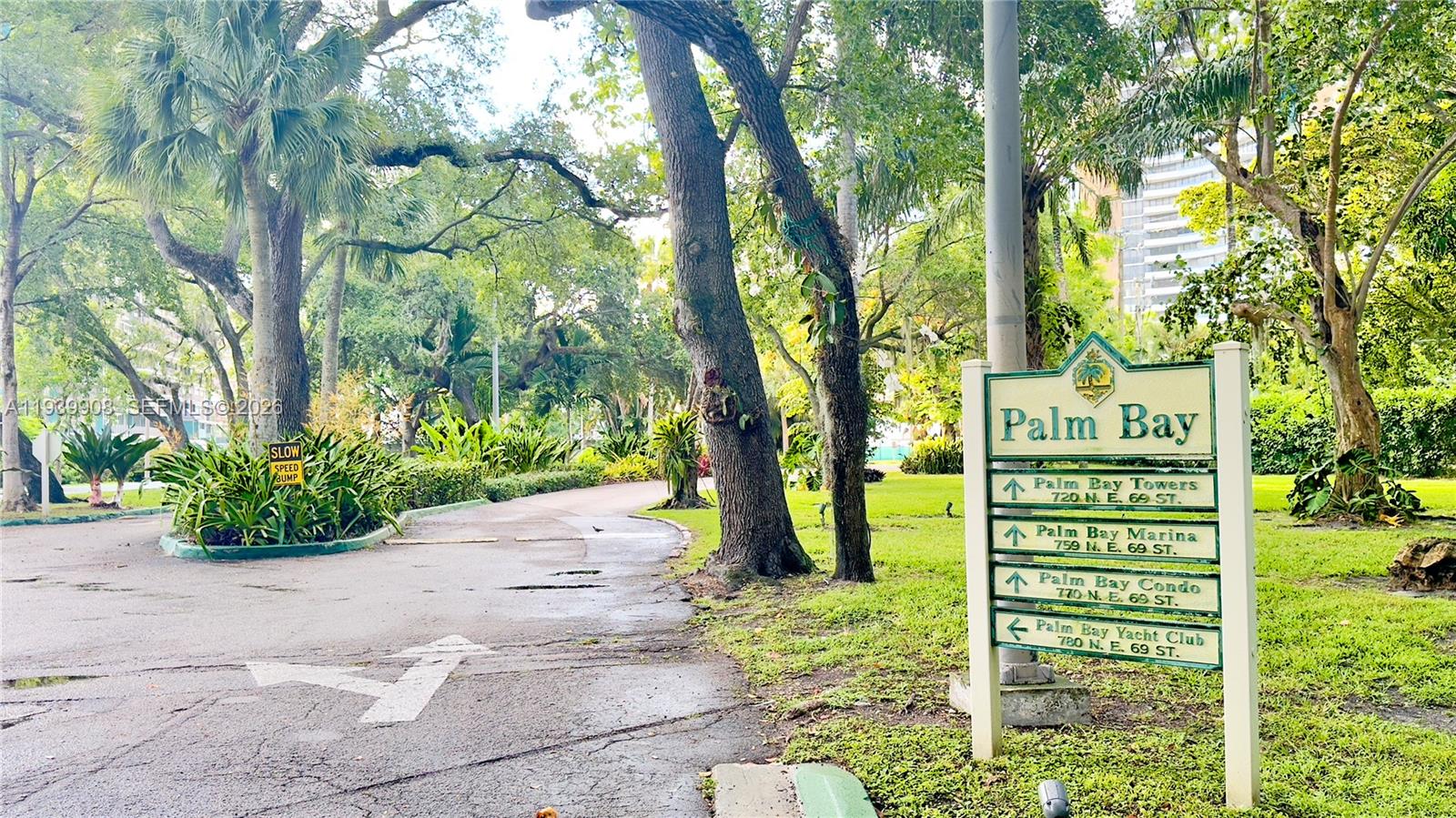 770 Northeast 69th Street, Unit 6F Miami, FL 33138 - Photo 25 of 47 a sign of a park on a tree