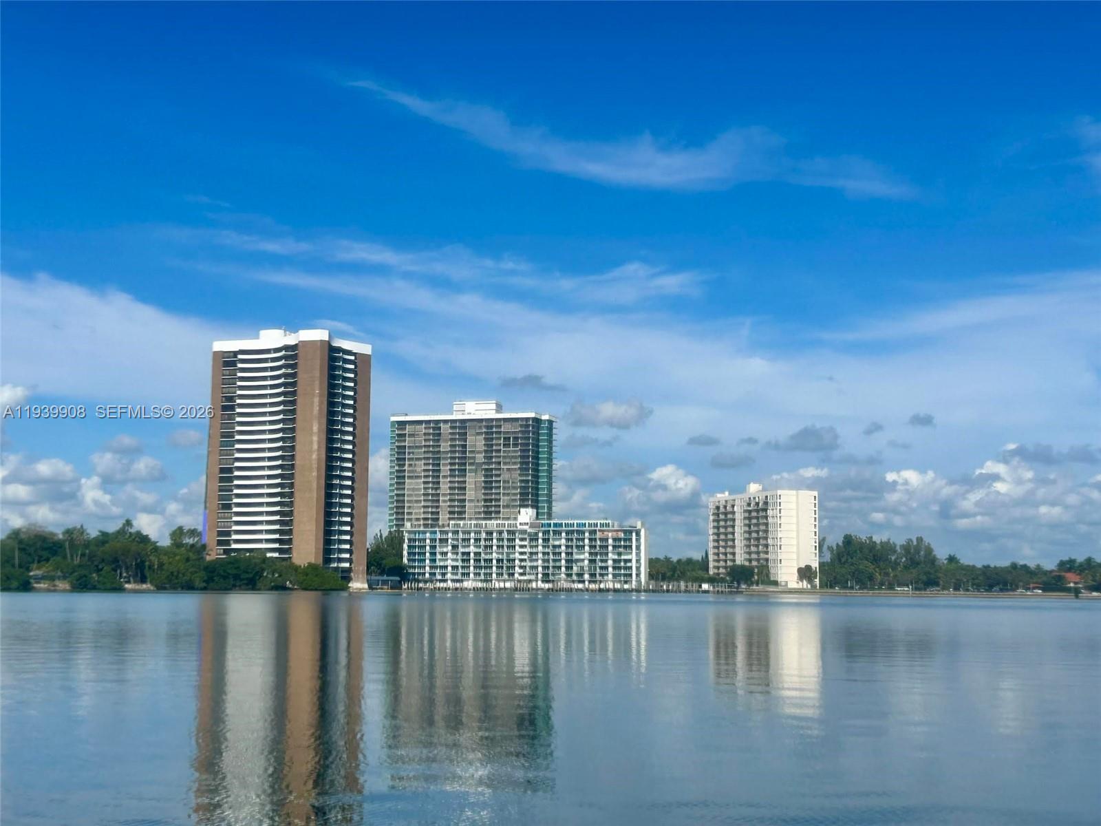 770 Northeast 69th Street, Unit 6F Miami, FL 33138 - Photo 3 of 47 a view of building with lake view and tall buildings