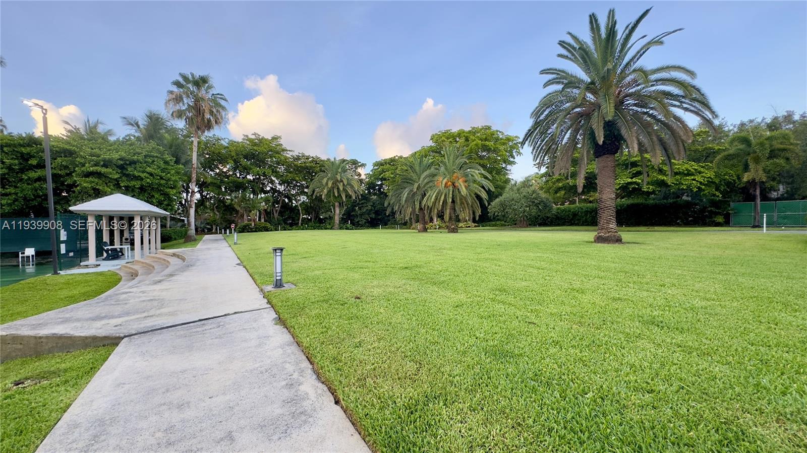 770 Northeast 69th Street, Unit 6F Miami, FL 33138 - Photo 31 of 47 a view of a house with a yard and entertaining space