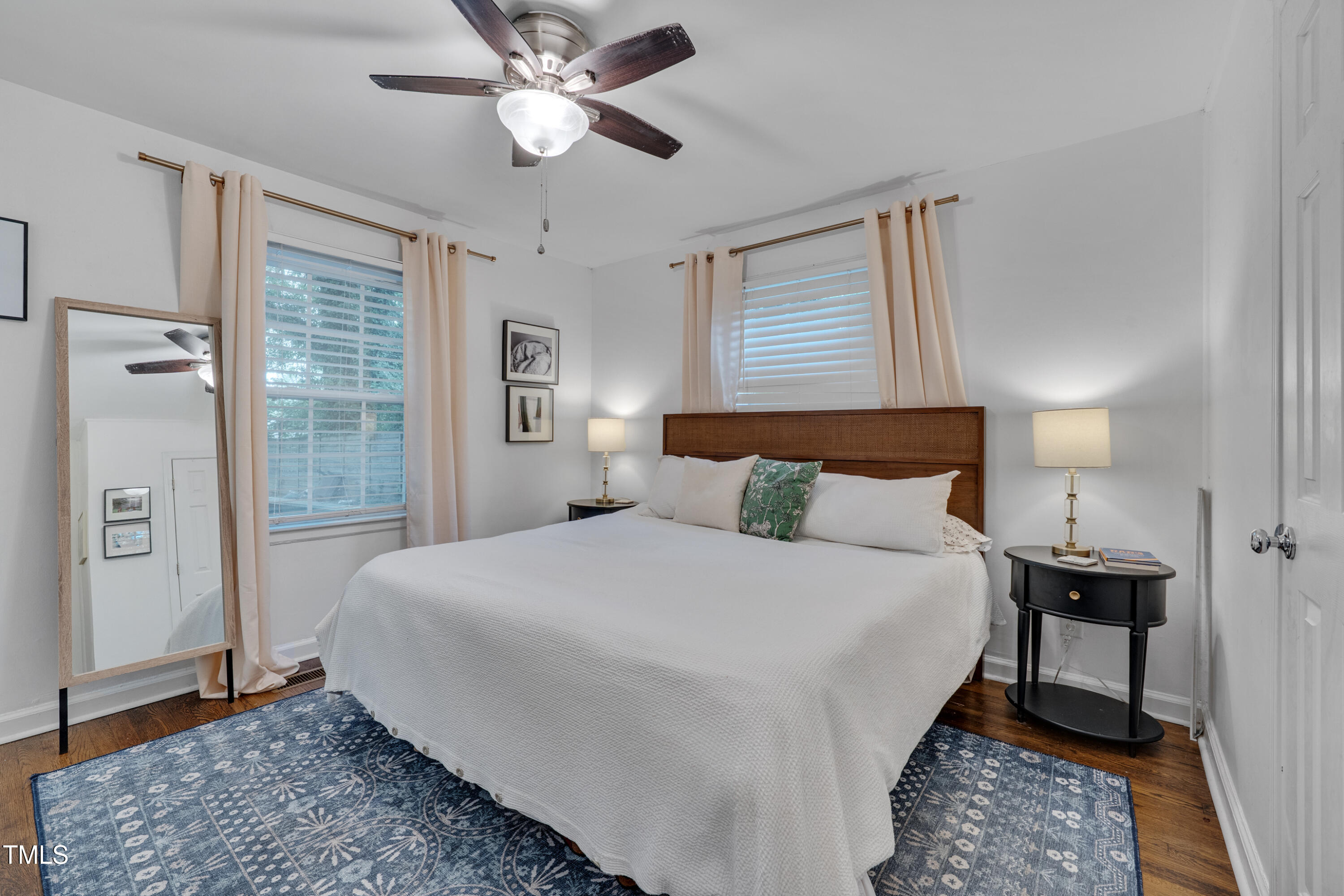 2442 Stevens Road Raleigh, NC 27610 - Photo 11 of 22 a bedroom with a bed and a window