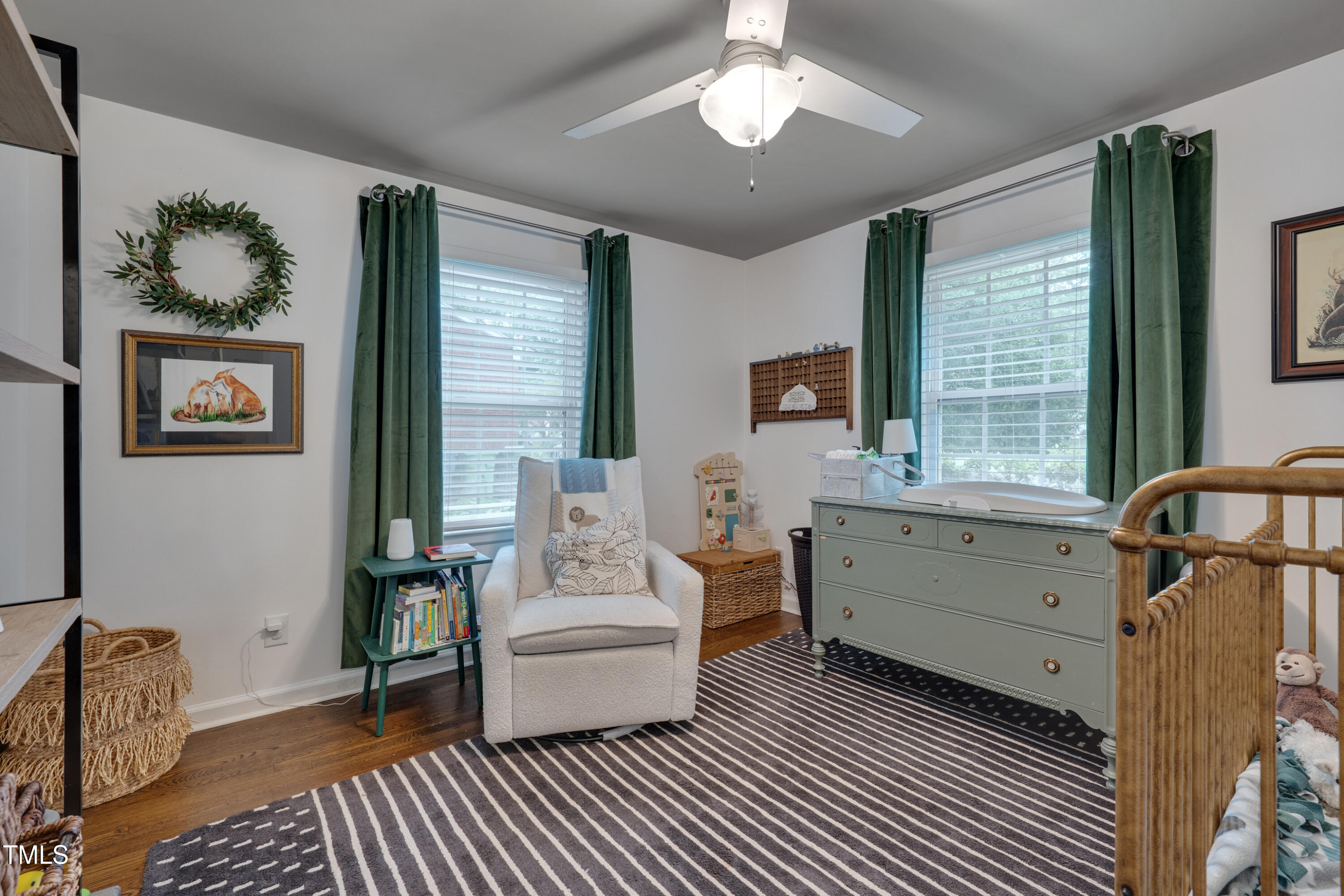 2442 Stevens Road Raleigh, NC 27610 - Photo 13 of 22 a bedroom with a bed and a window