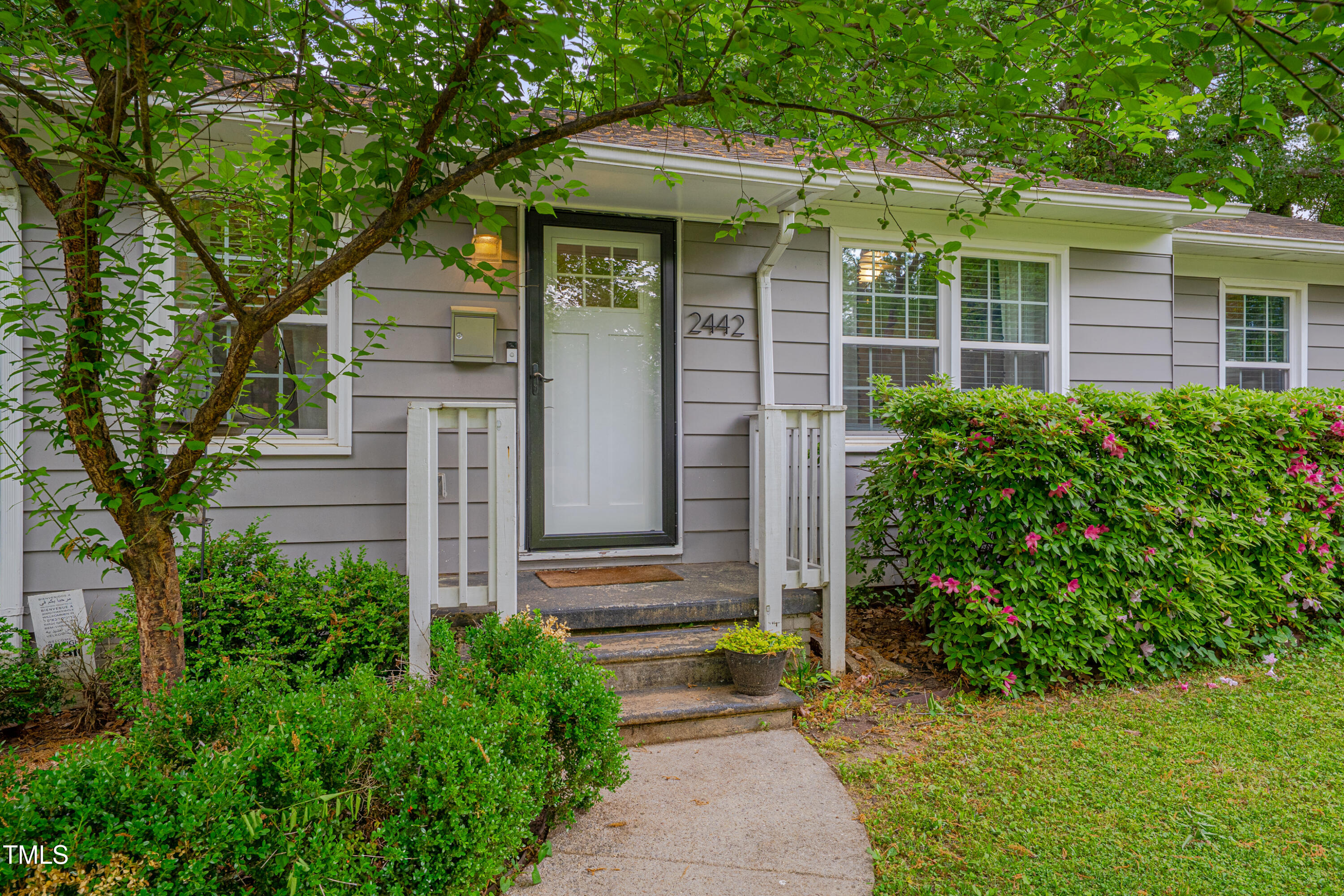 2442 Stevens Road Raleigh, NC 27610 - Photo 2 of 22 a front view of a house with garden