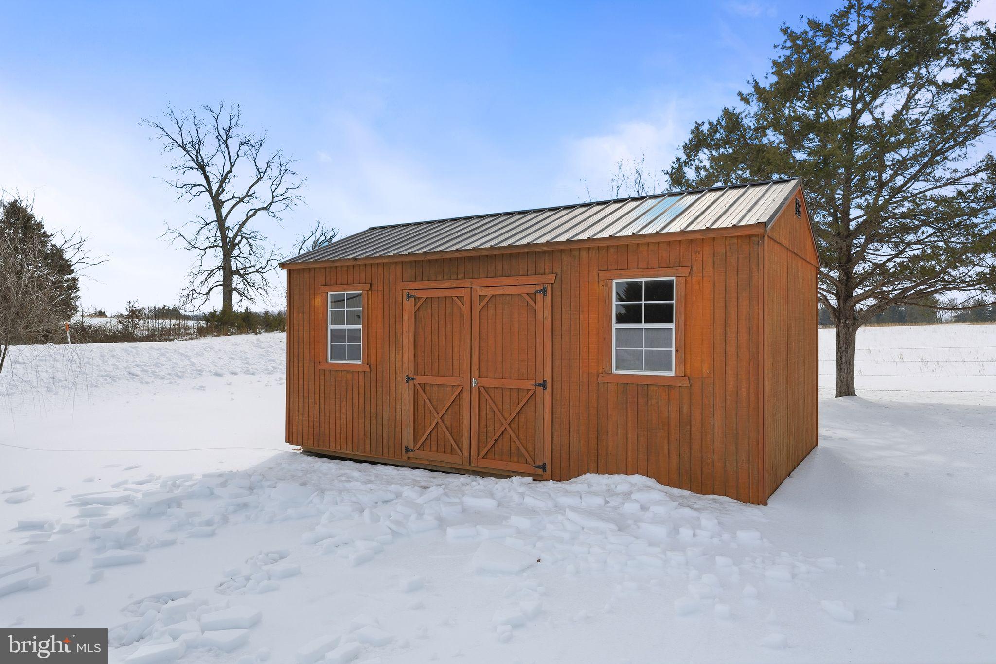 16355 Pollard Lane Culpeper, VA 22701 - Photo 12 of 56 a view of a house with a yard