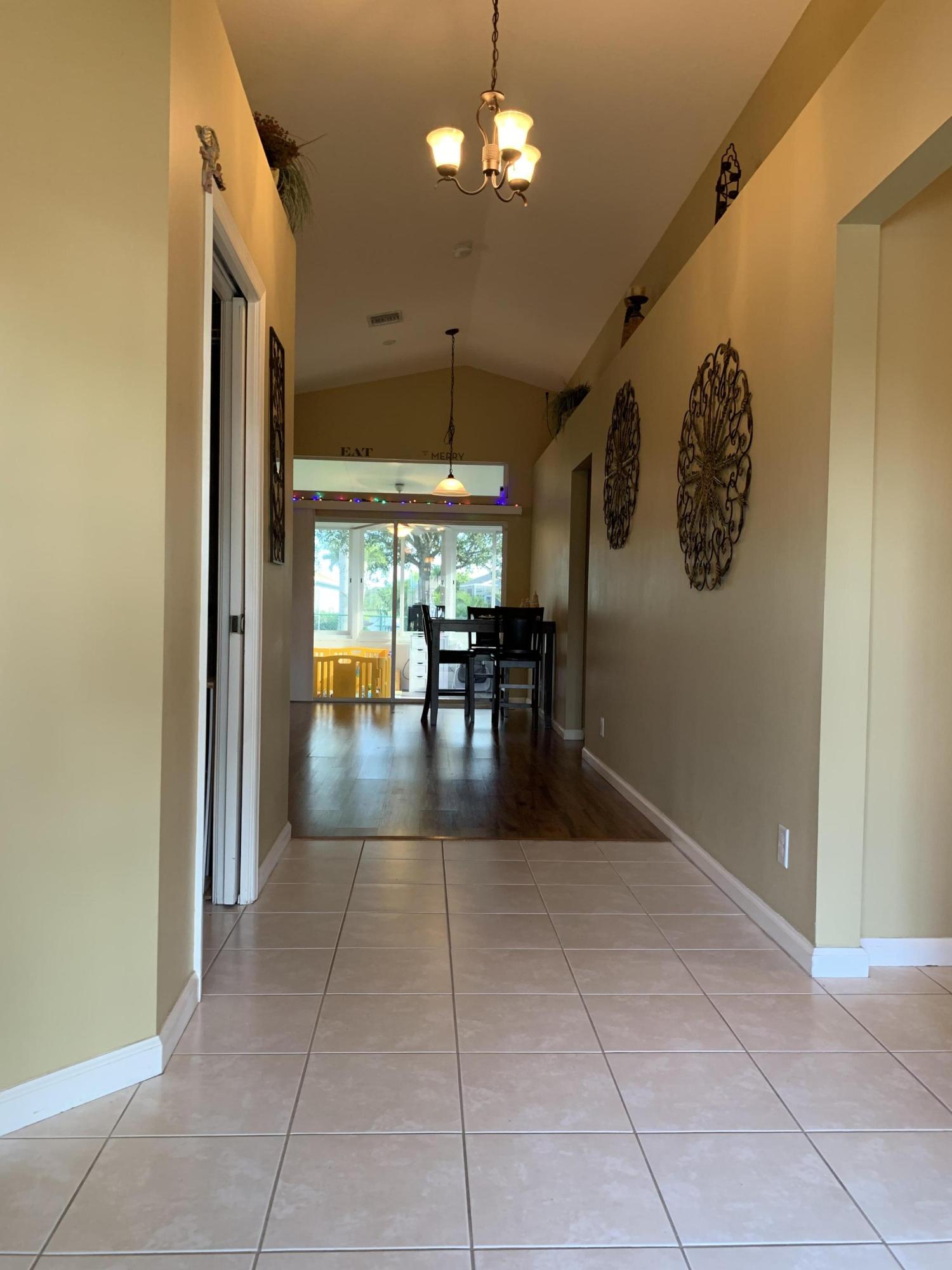 8940 Southwest Chrysler Circle Stuart, FL 34997 - Photo 3 of 27 entryway