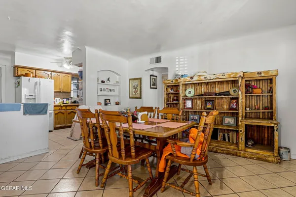 a view of a dining room with furniture