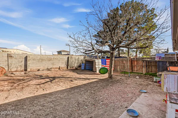 an aerial view of residential house with outdoor space and parking