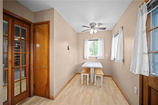 a view of a room with furniture window and wooden floor