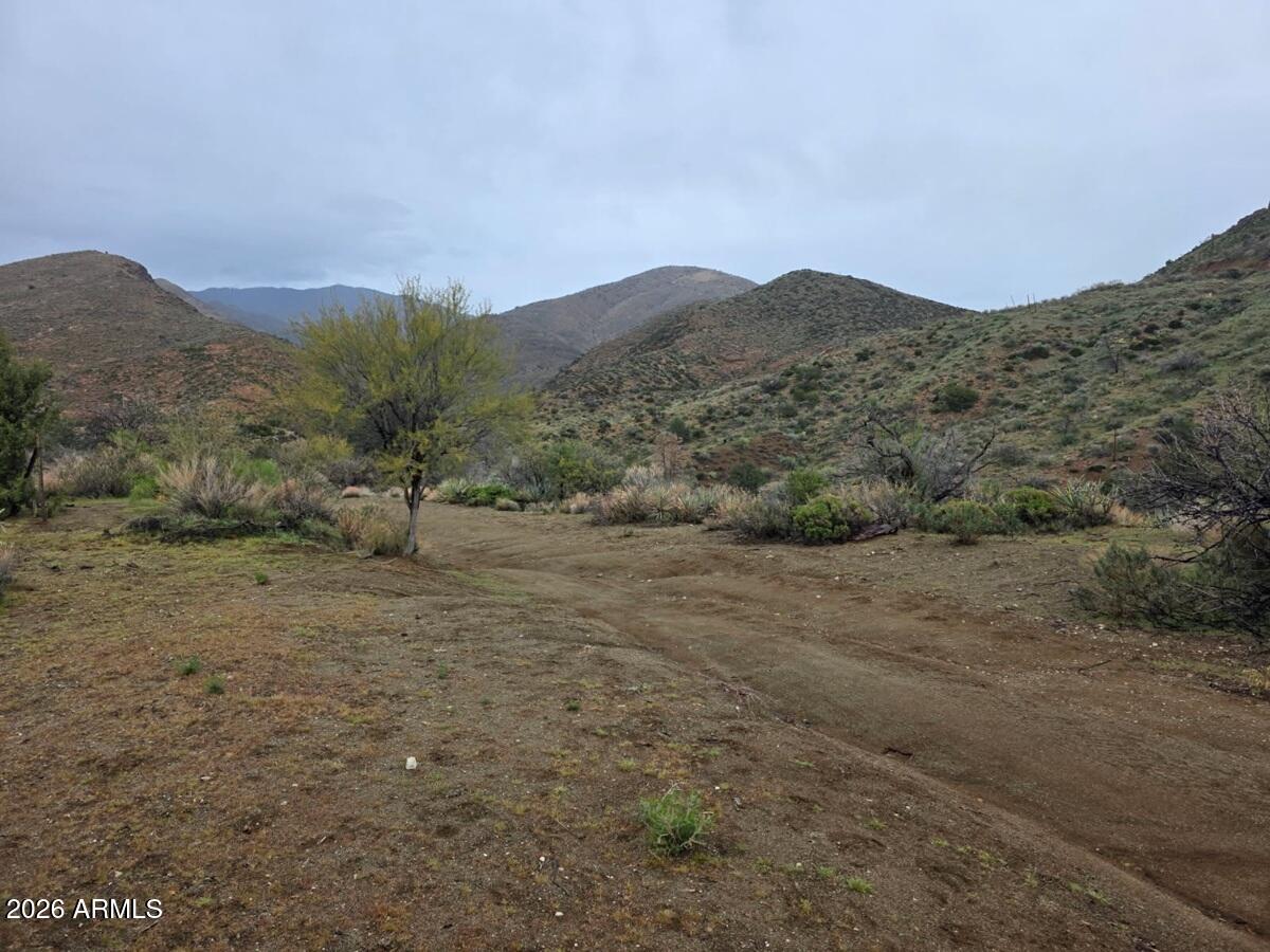 158 South Az State Highway Winkelman, AZ 85192 - Photo 11 of 30 a view of a dry field with mountains in the background