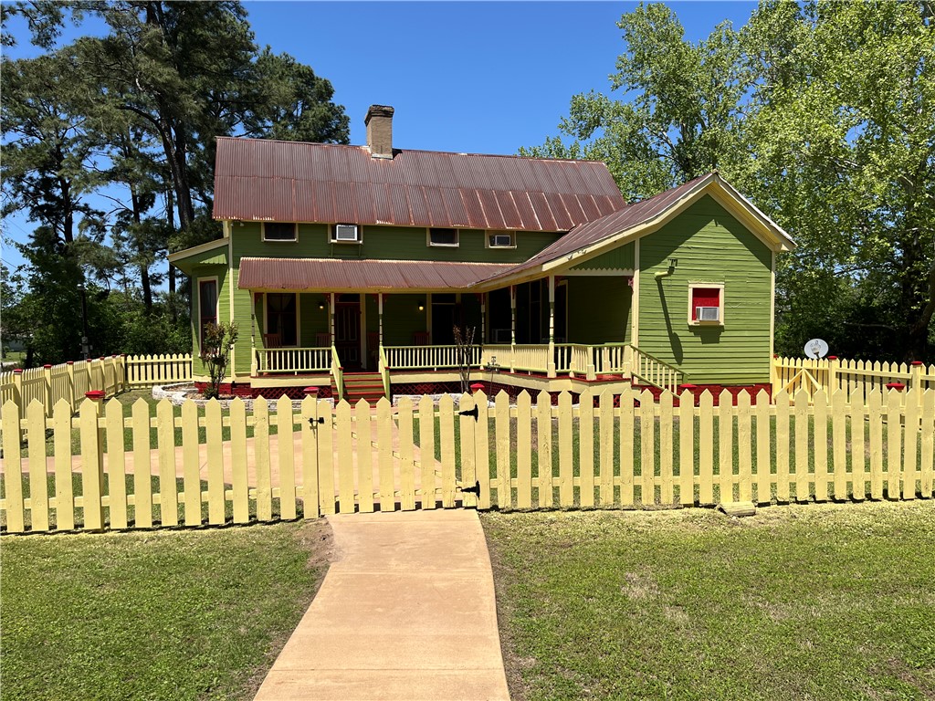 1100 Maple Calvert, TX 77837 - Photo 2 of 32 a front view of a house with a yard